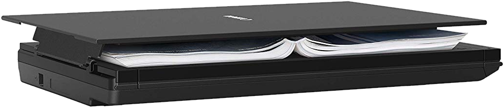 Scanner noir avec couvercle ouvert et un livre à l'intérieur.