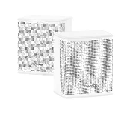 Two white Bose speakers. Bose logo is visible.
