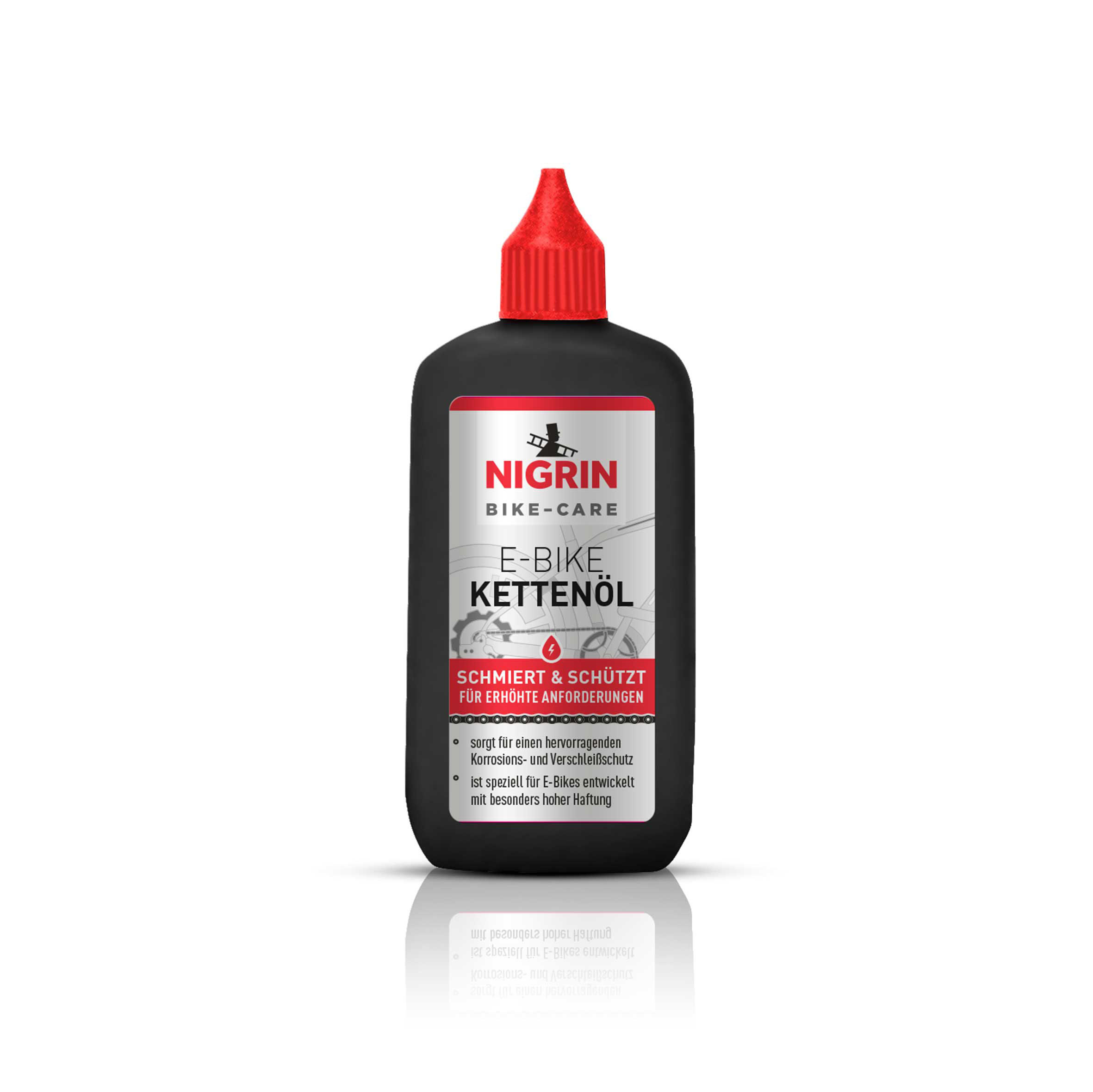 Schwarze Flasche Kettenöl mit rotem Deckel, Produktetikett in Weiß.