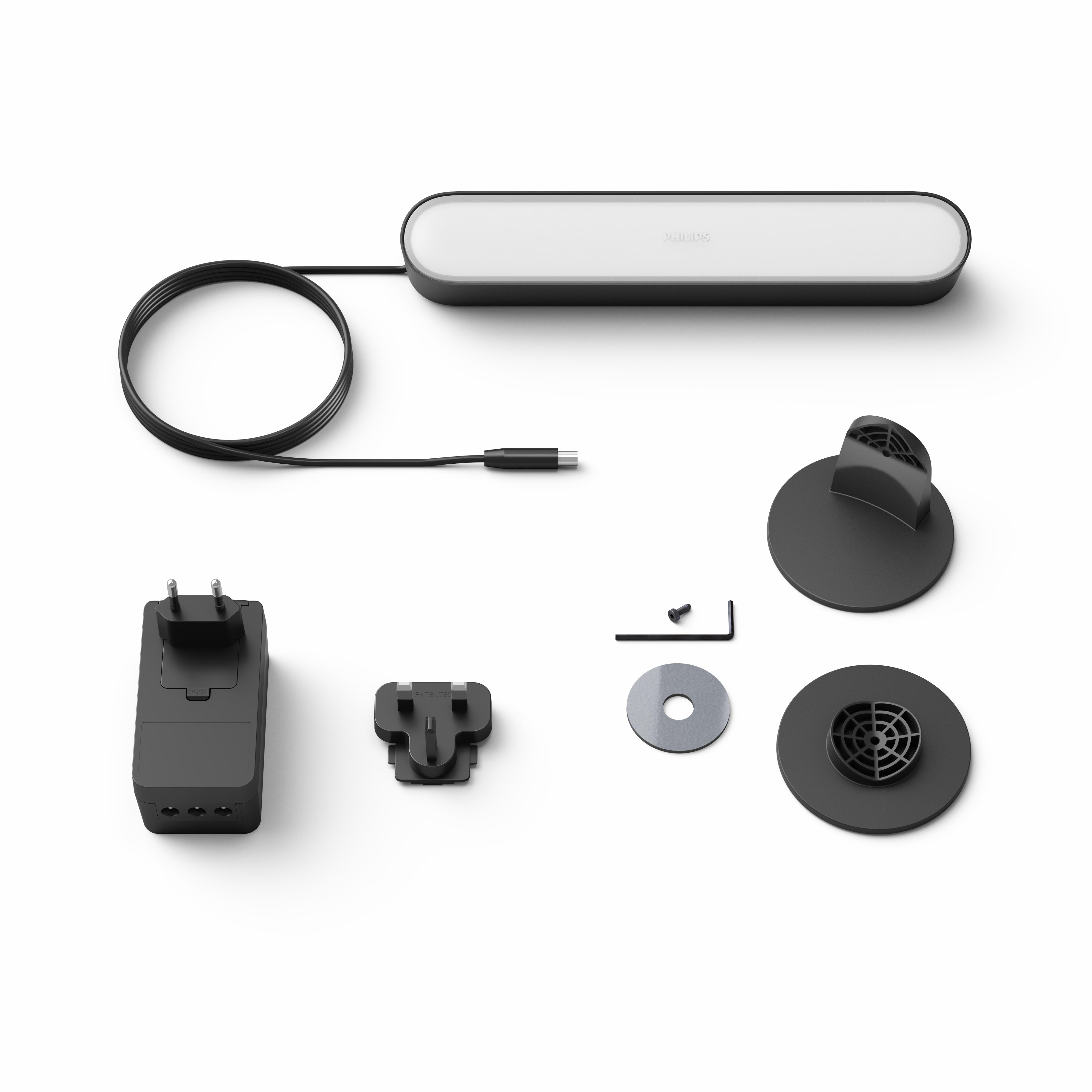 Philips Hue light bar and accessories: power supply, plugs, stands, and a screw.