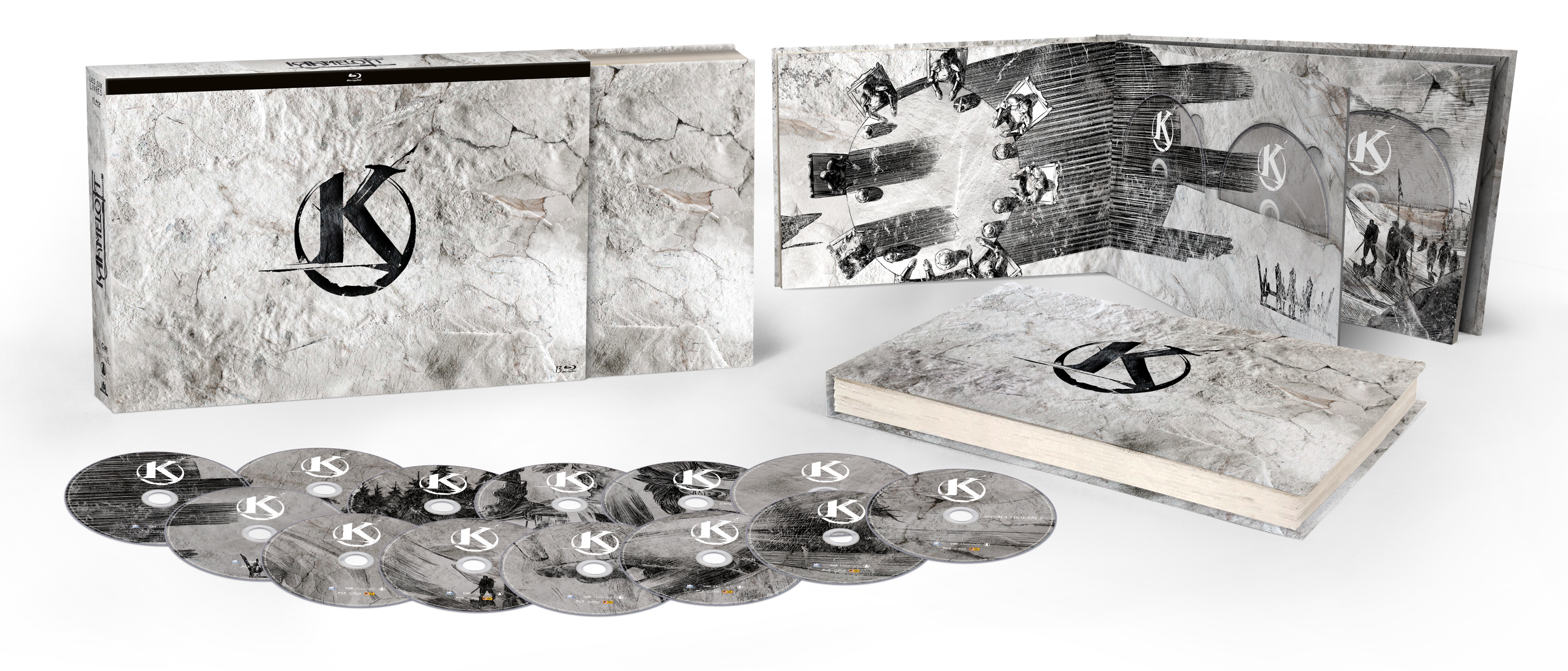 Ensemble d'albums avec plusieurs disques et un livre à couverture rigide, le tout avec un design blanc texturé.