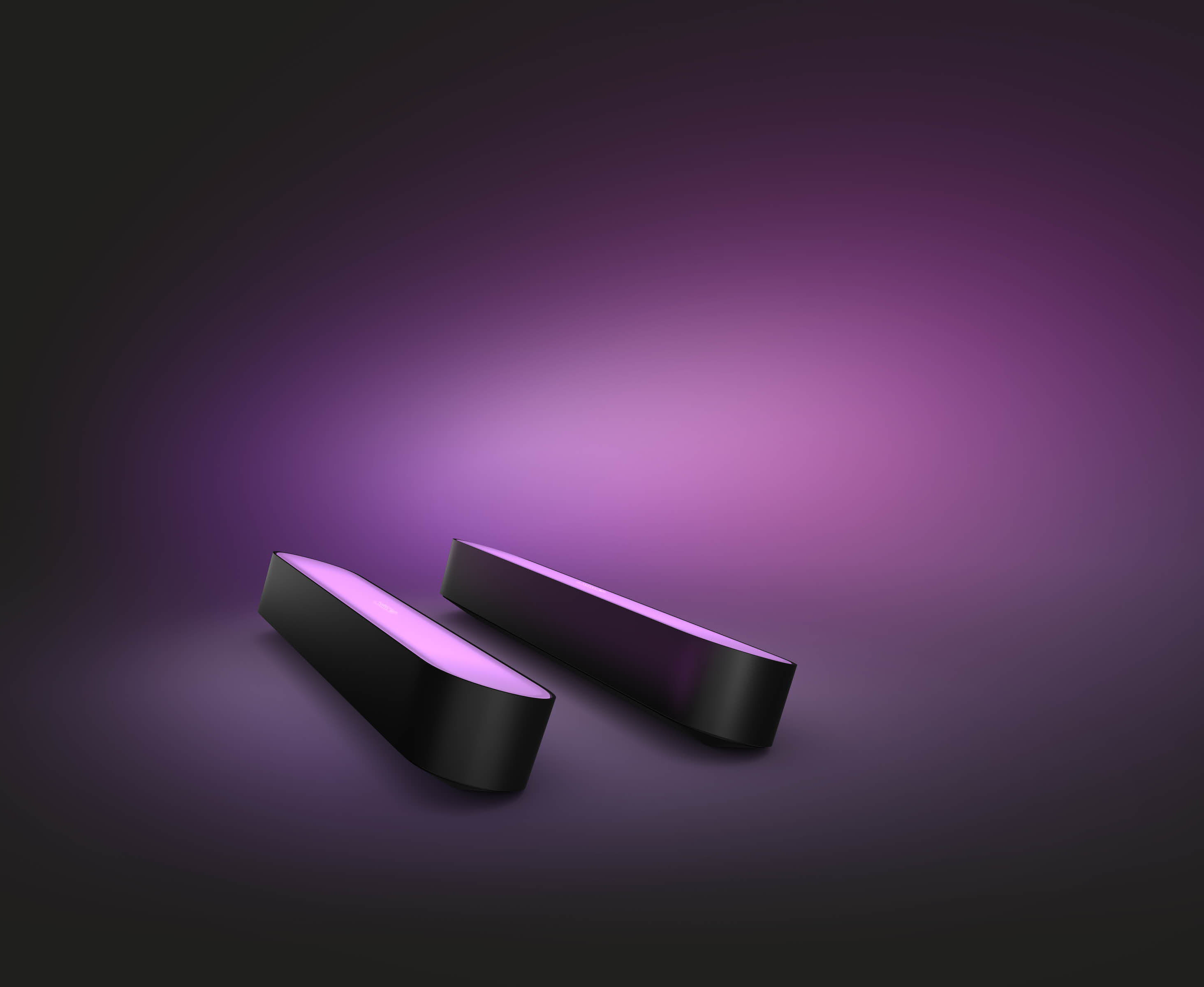 Two black, rectangular light bars, illuminated with pink glow, on a purple gradient background.