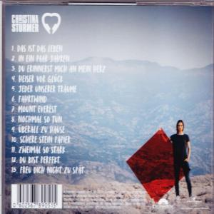 Rückseite einer CD-Hülle. Es zeigt eine Frau und eine Berglandschaft. Text ist ebenfalls vorhanden.