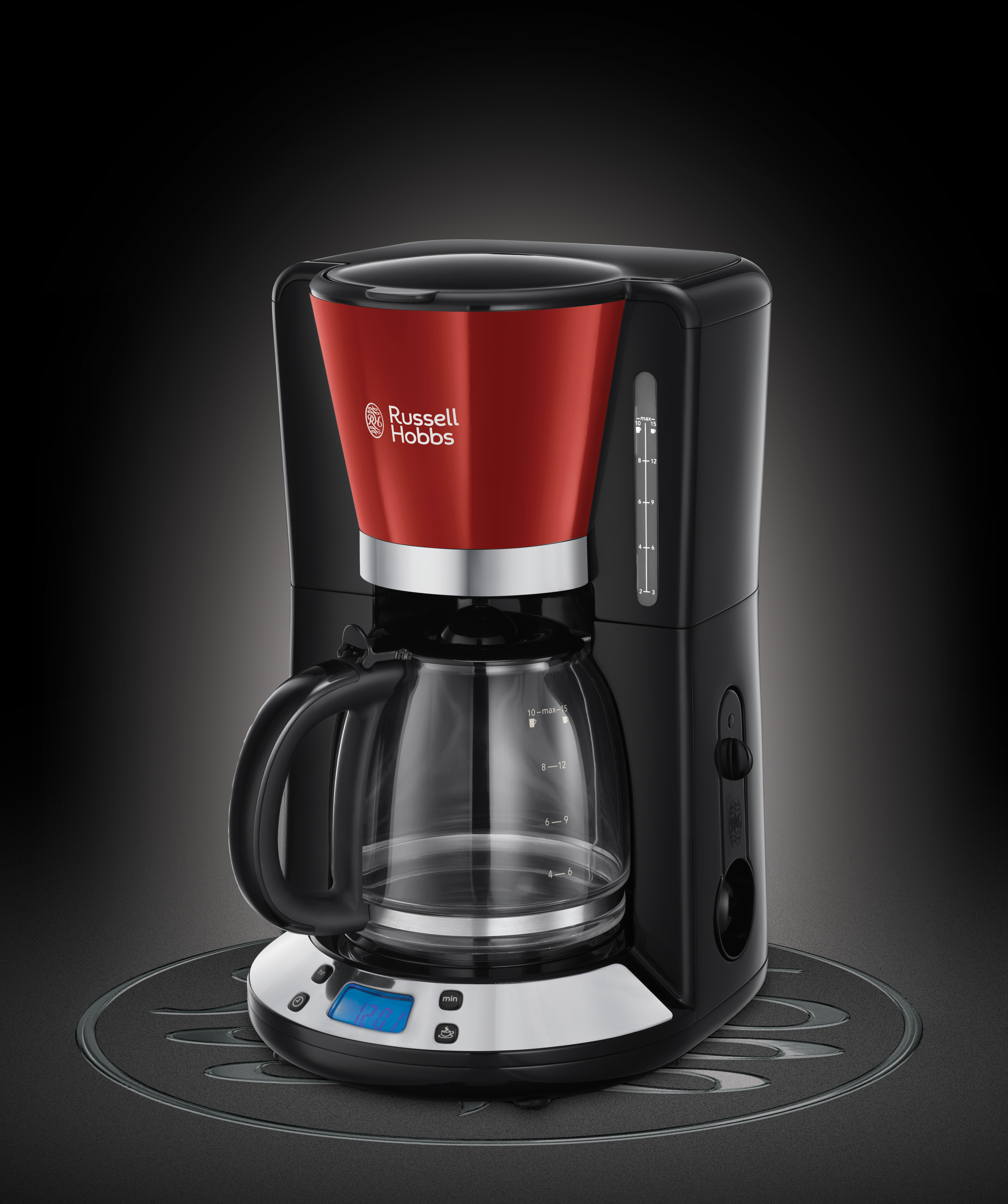 Fekete-piros Russell Hobbs kávéfőző. Egy átlátszó üvegkancsó a piros szűrő alatt van.