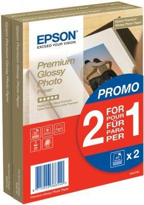 Dos paquetes de papel fotográfico Epson Premium Glossy en una promo 2 por 1 con banner rojo y código de barras.