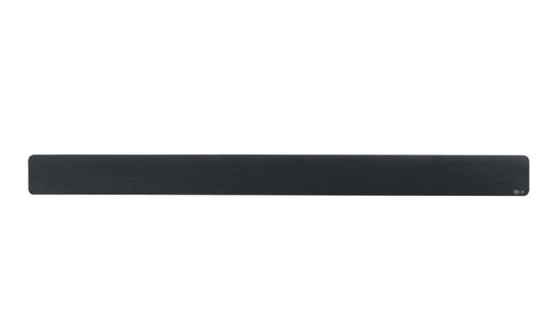 Una barra de sonido negra con el logo de LG sobre un fondo blanco.