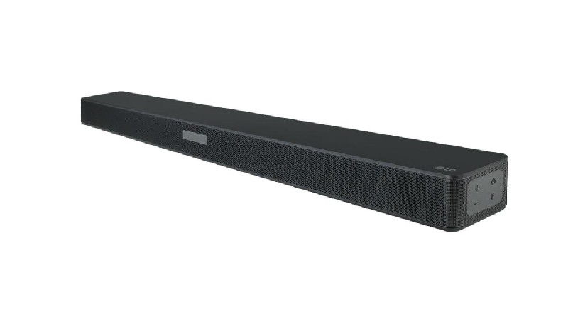 Una barra de sonido LG negra. Es larga y rectangular con una parte frontal de malla y botones laterales.