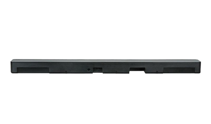Barra de sonido negra. Forma rectangular con puertos en la parte trasera.