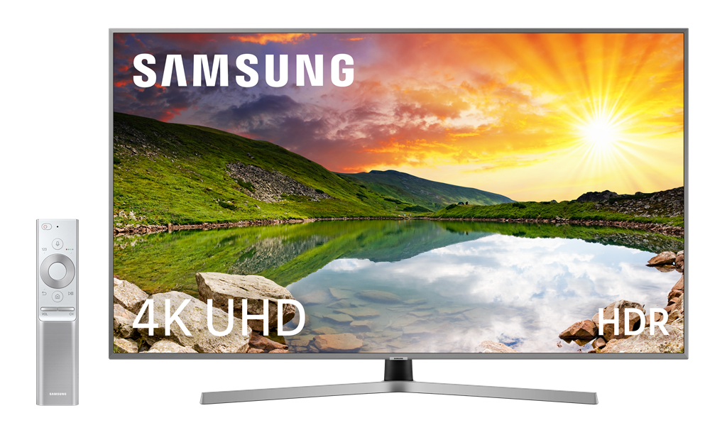 TV Samsung con mando, mostrando escena de lago montañoso. 4K UHD HDR.
