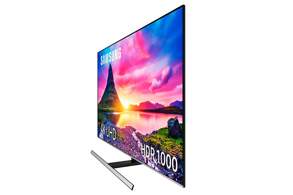 TV Samsung muestra un paisaje. Montañas, lago y cielo vibrante son visibles.
