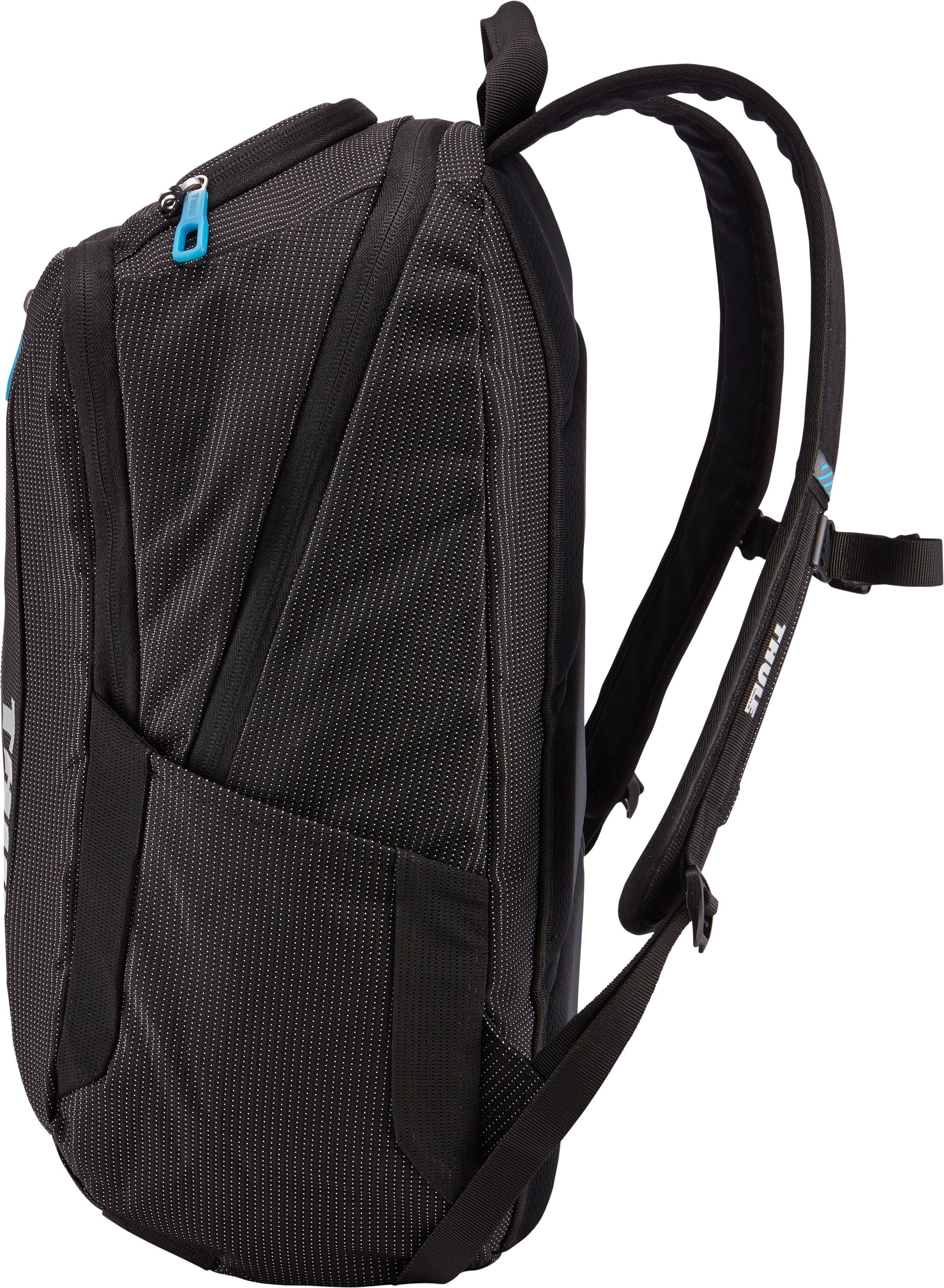 Mochila negra, vista lateral, con un patrón de puntos blancos y una cremallera azul claro. Logotipo Thule.