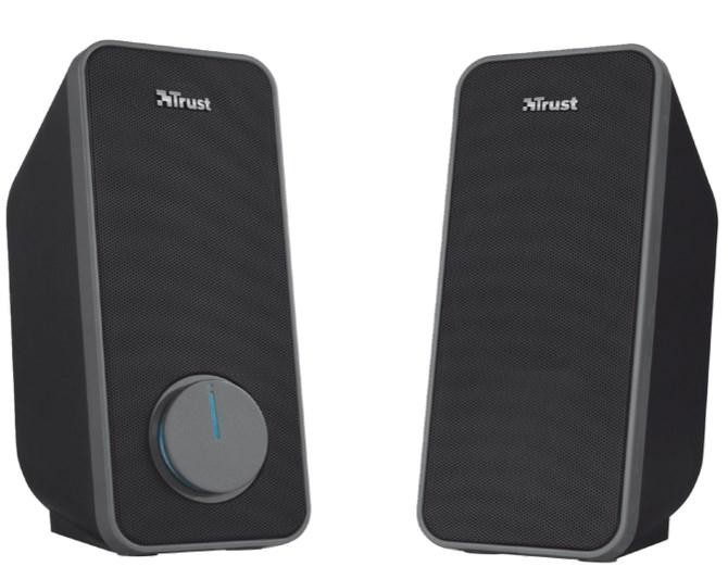 Dos altavoces de computadora negros con control de volumen en el altavoz izquierdo.
