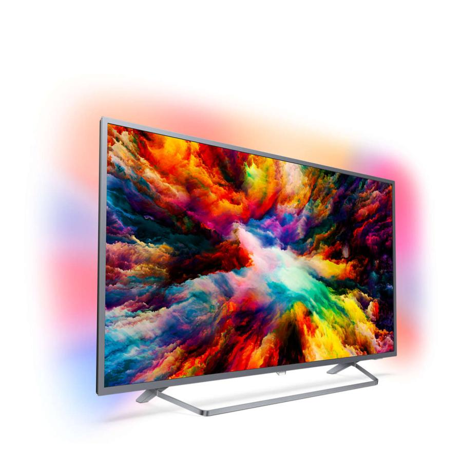 Un televisor moderno mostrando arte abstracto colorido, sobre un fondo blanco.