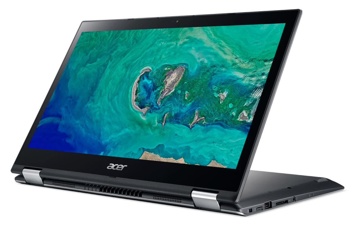 Laptop Acer negro abierto, mostrando una imagen abstracta verde-azul. La pantalla está en ángulo hacia arriba.