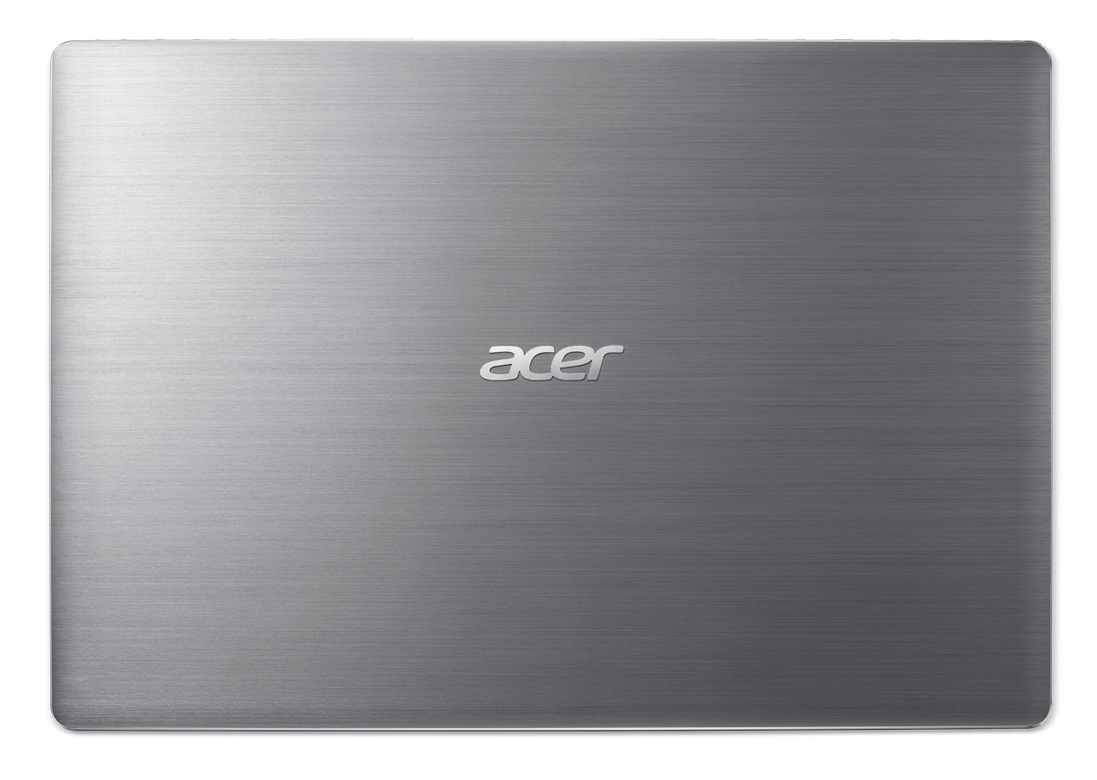 Tapa de portátil Acer plateada. Logotipo de Acer en el centro. Acabado mate. Fondo oscuro.
