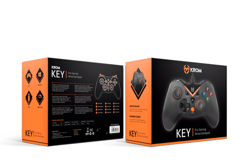 Caja para un gamepad con cable KROM KEY Pro Gaming, naranja y negro, sobre fondo oscuro.