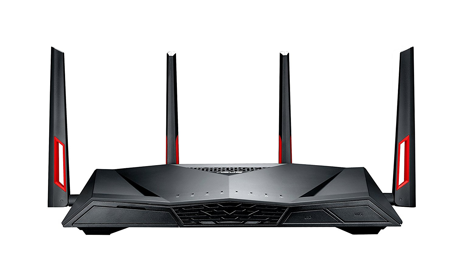 Un router negro con cuatro antenas y detalles rojos. El router tiene varios puertos.