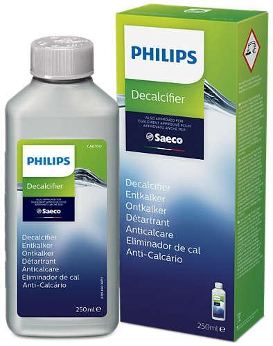 Botella y caja de descalcificador Philips. La botella muestra líquido, la caja tiene texto y logo.