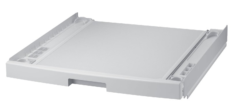 Base de lavadora blanca. Es una bandeja de plástico rectangular y plana con bordes elevados.