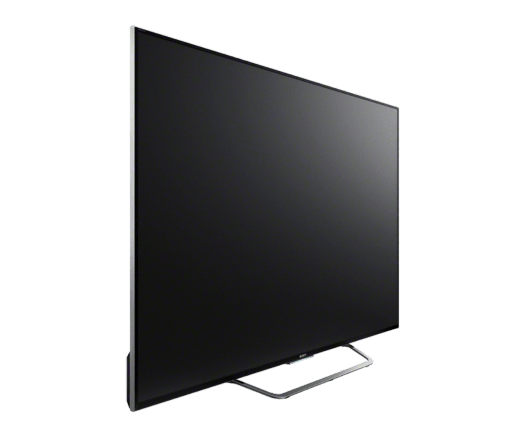 Una pantalla de televisión grande y negra sobre un soporte. La pantalla está en blanco y el televisor está inclinado.