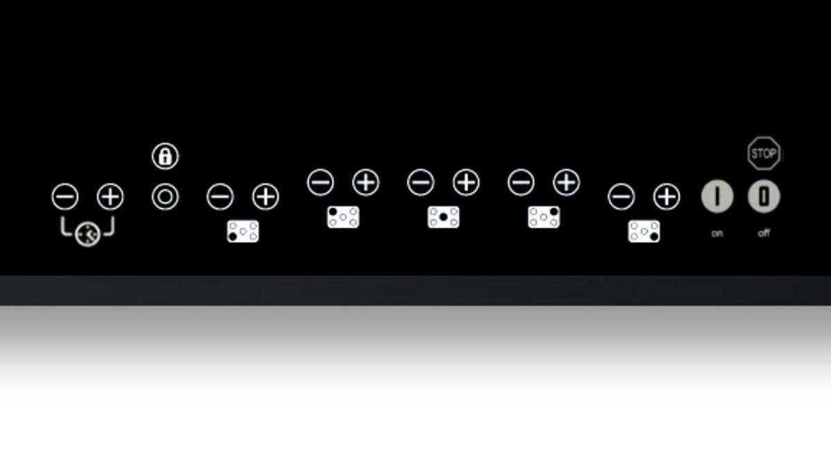 Panel de control negro de placa de inducción con iconos de encendido, bloqueo y ajustes de quemador.