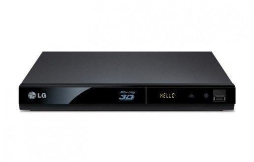Reproductor Blu-ray LG negro. La pantalla muestra 'HELLO'. El disco tiene un logo 3D.