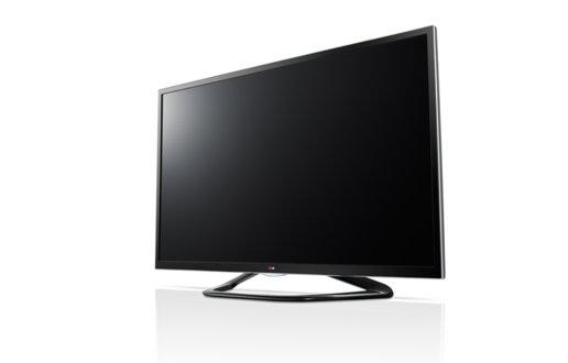 Televisor LG negro. Pantalla grande y plana con base curva. Sobre superficie blanca.