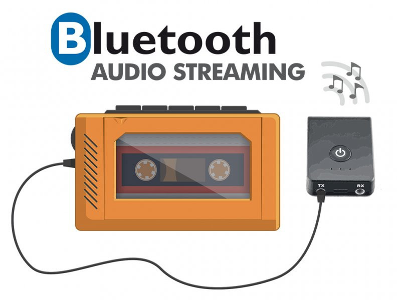 Un lecteur de cassettes orange avec un émetteur bluetooth et un récepteur noir.