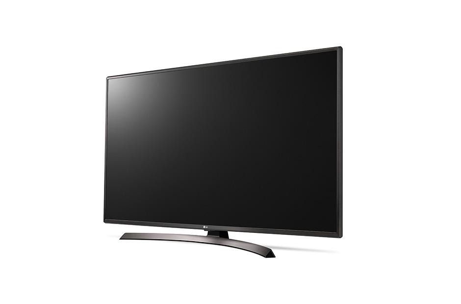 Un televisor LG negro sobre fondo blanco. La pantalla está apagada. El soporte es curvo y plateado.