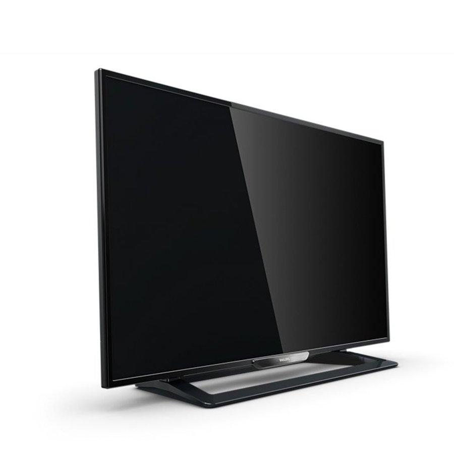 TV de pantalla plana negro sobre soporte, mostrando pantalla oscura. Aislado sobre fondo blanco.