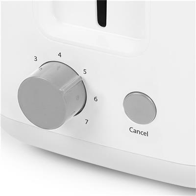 Gros plan sur le panneau de commande d'un grille-pain blanc avec un cadran et un bouton d'annulation.