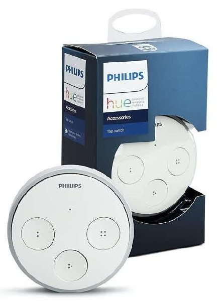 Interruptor Philips Hue Tap blanco, empaquetado y expuesto. El interruptor tiene tres botones.