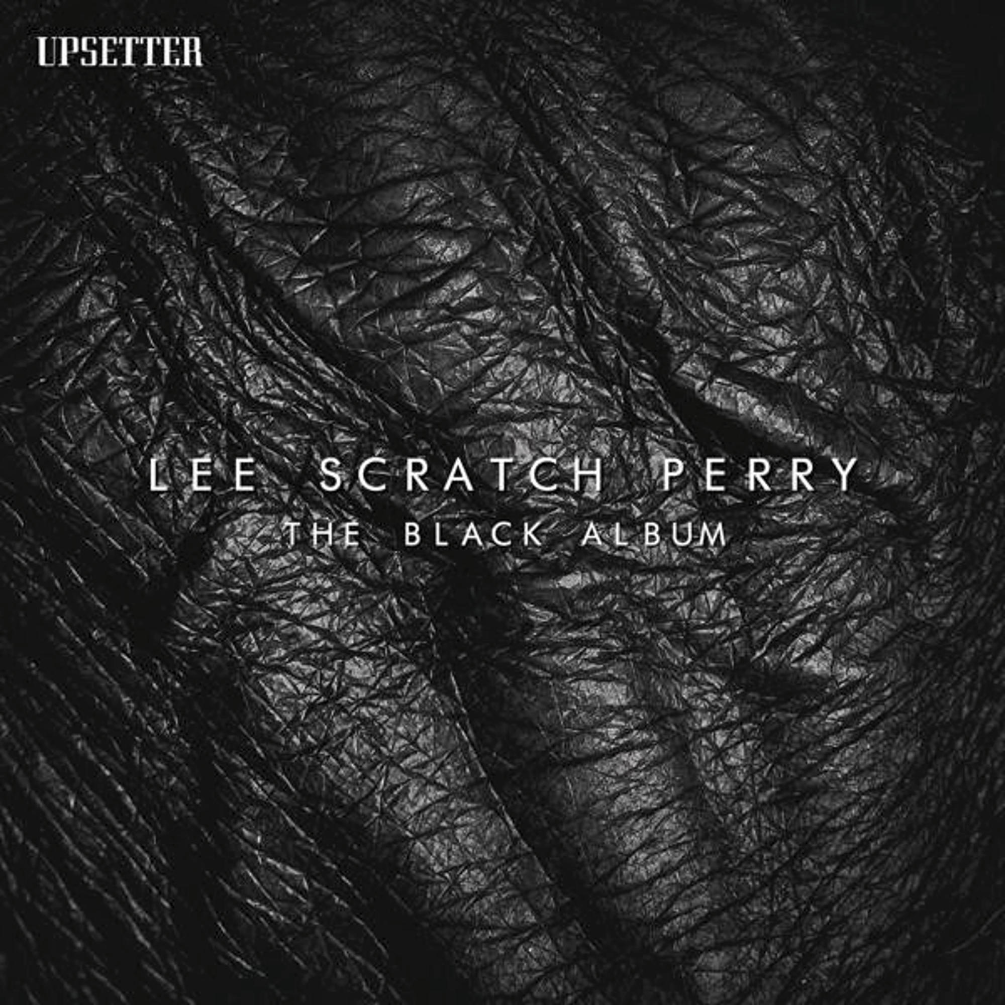 Albumhoes: Zwart getextureerd oppervlak met tekst 'Lee Scratch Perry The Black Album' en 'Upsetter'.