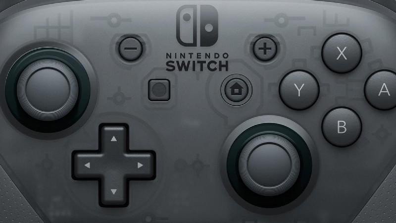 Mando gris de Nintendo Switch con botones y cruceta direccional.
