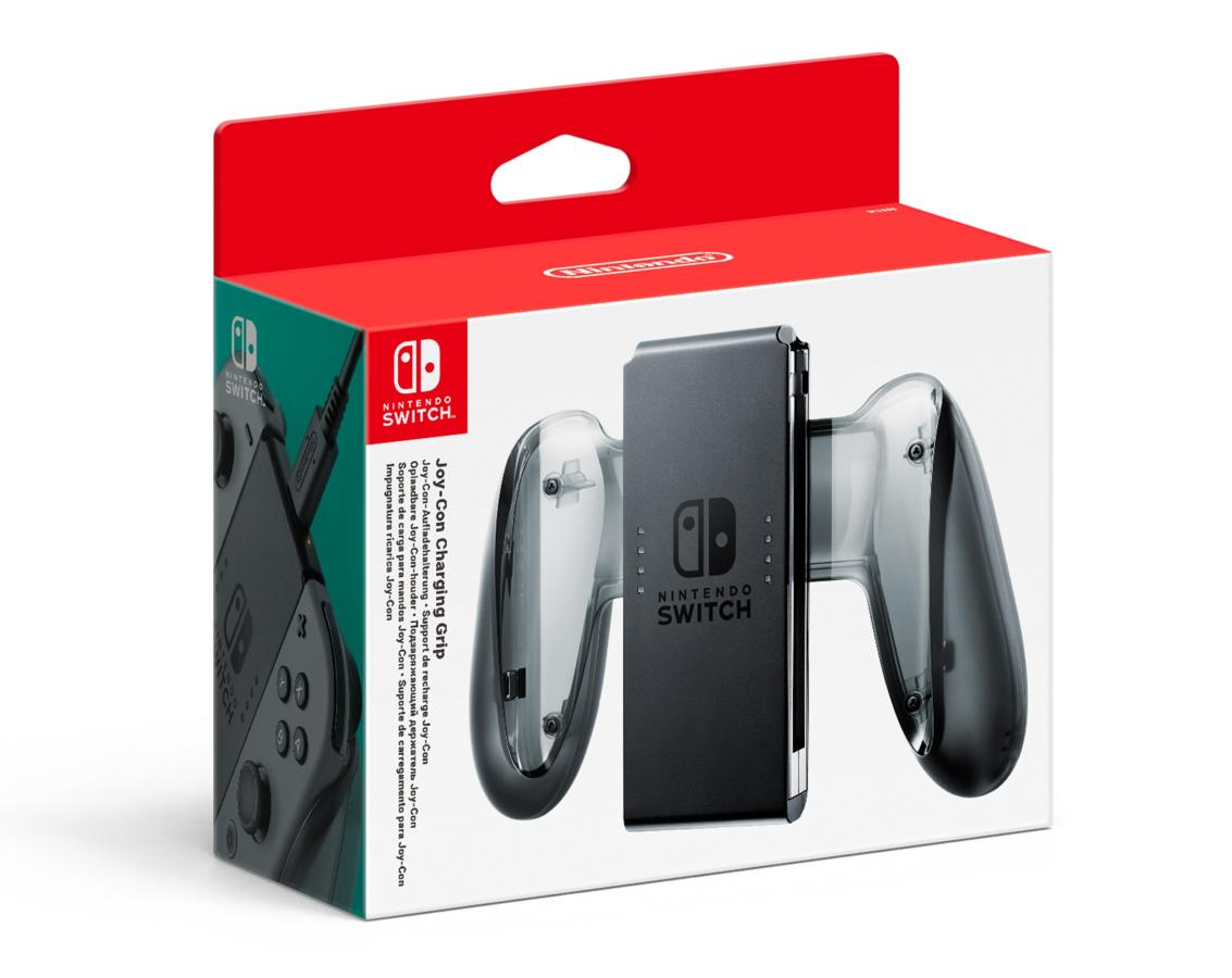Un soporte de carga Joy-Con de Nintendo Switch en su embalaje original, con texto y logo sobre fondo blanco.