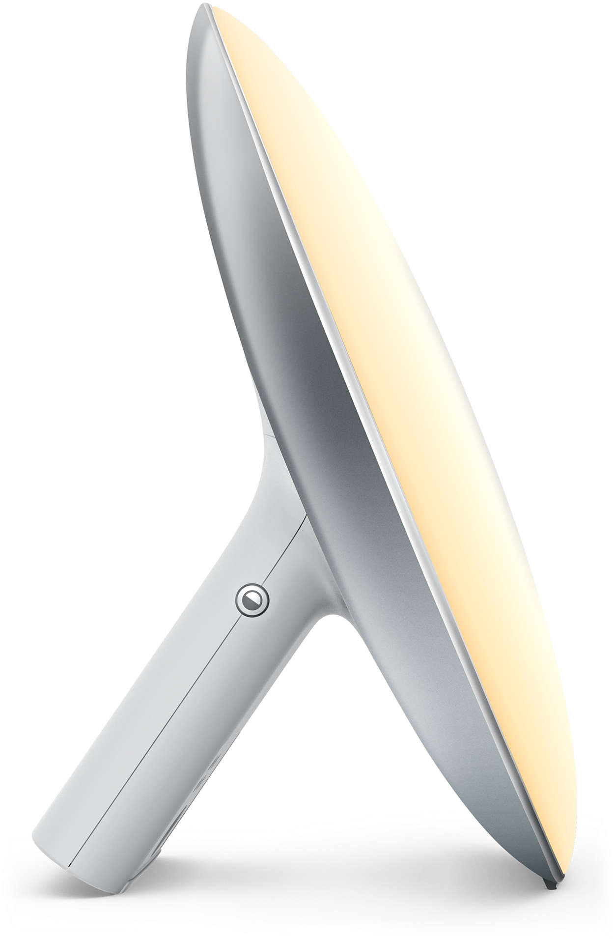 Une lampe de luminothérapie blanche et argentée. Elle a un design incurvé et un support. Elle est allumée.