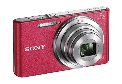 Cámara digital Sony roja. Ribete plateado y una lente en el centro. Logotipo de Sony visible.