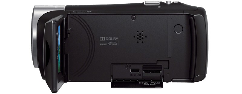 Videocámara Sony negra. Muestra la parte trasera con una pantalla abierta y puertos.