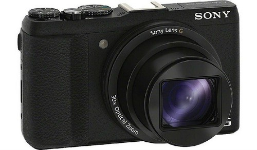 Cámara Sony negra, vista en ángulo. Lente centrada. Zoom óptico 30x etiquetado.