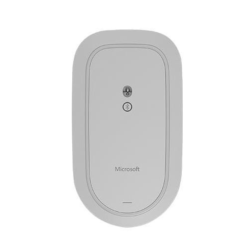 Ratón blanco de Microsoft. Tiene dos botones y un símbolo Bluetooth. El diseño es ovalado y limpio.