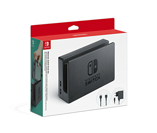 Set de base Nintendo Switch en caja. Base negra, dos cables y adaptador de corriente visibles.