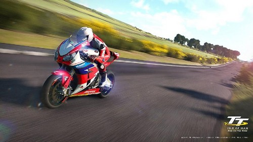 Corredor de motos en pista, fondo borroso, Isle of Man TT.