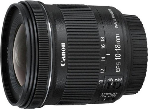 Lente Canon EFS 10-18mm. Lente negro con anillos de enfoque y zoom.
