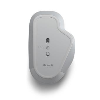 Un ratón ergonómico Microsoft, gris claro, con botones y un logotipo.