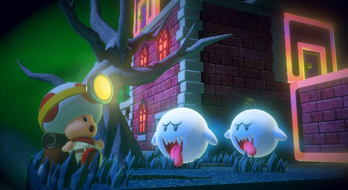 Una escena de un videojuego. Toad con un faro frente a una casa embrujada. Dos fantasmas flotan.