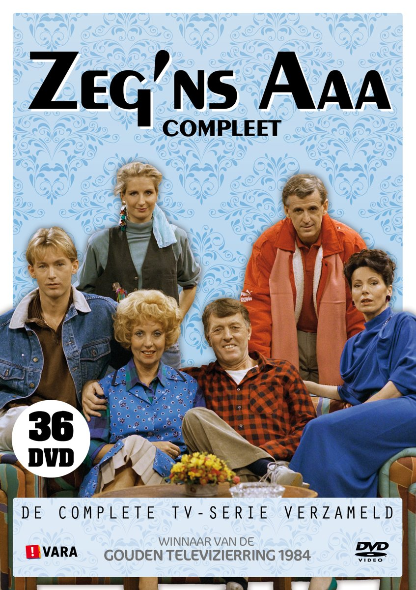 DVD-hoes met een groep mensen. Tekst: Zeg 'ns AAA, Compleet. Een blauwe bloemenachtergrond is zichtbaar.