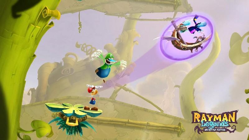 Escena del juego Rayman Legends: un personaje volando a través de un nivel con elementos vegetales.