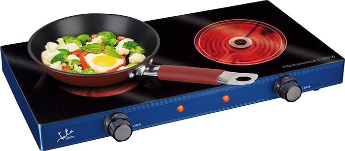Placa de cocina eléctrica con sartén con comida, quemador rojo y mandos.