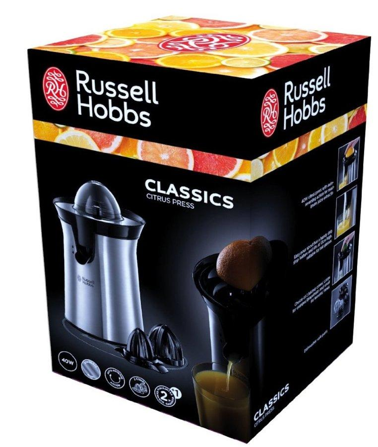 Exprimidor de cítricos Russell Hobbs en caja. Base plateada, tapa negra, y rodajas de naranja en la tapa.