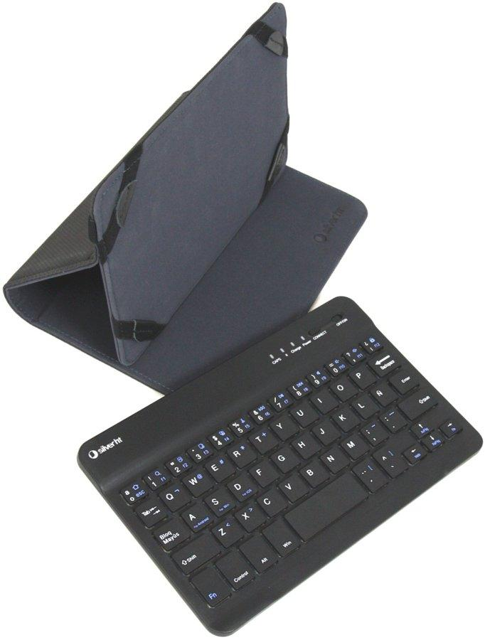 Teclado negro y funda de tableta gris oscuro. El teclado tiene teclas iluminadas en azul y un logotipo plateado.